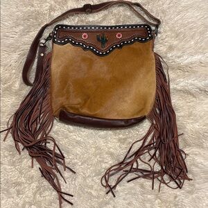 Fringe Cowhide Crossbody Myra bag.